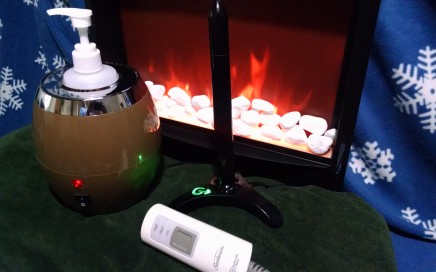 Heated Blanket, Lube Warmer, and Fleshlight sleeve warmer in front of a fire.